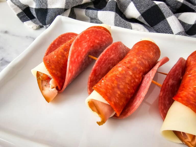 A picture of a plate of finished Italian Sub Roll Ups.