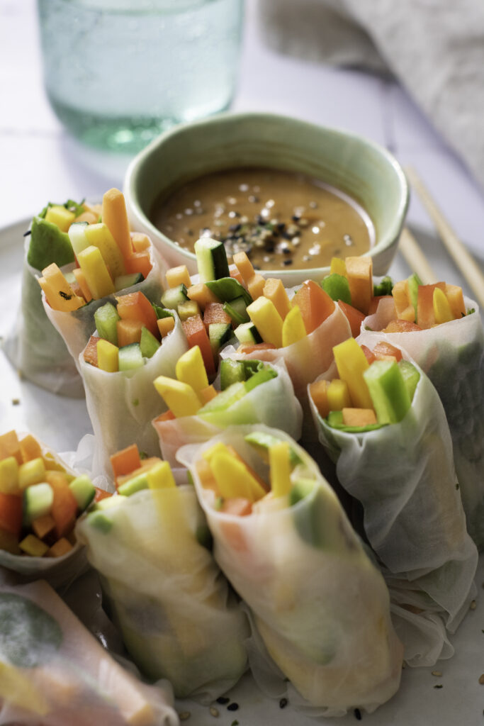 colorful veggie rolls with peanut sauce