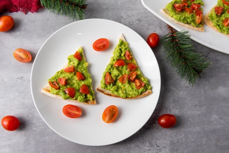 two slices of avocado christmas tree pita appetizer triangles