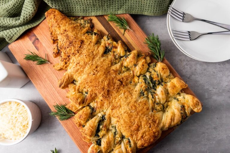 closeup of christmas tree dip puff pastry on a gray table