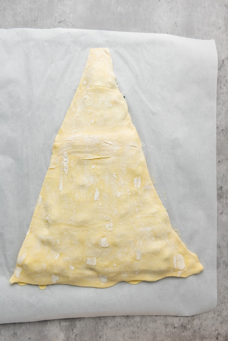 second pastry sheet, cut into another triangle, and placed on top of the first