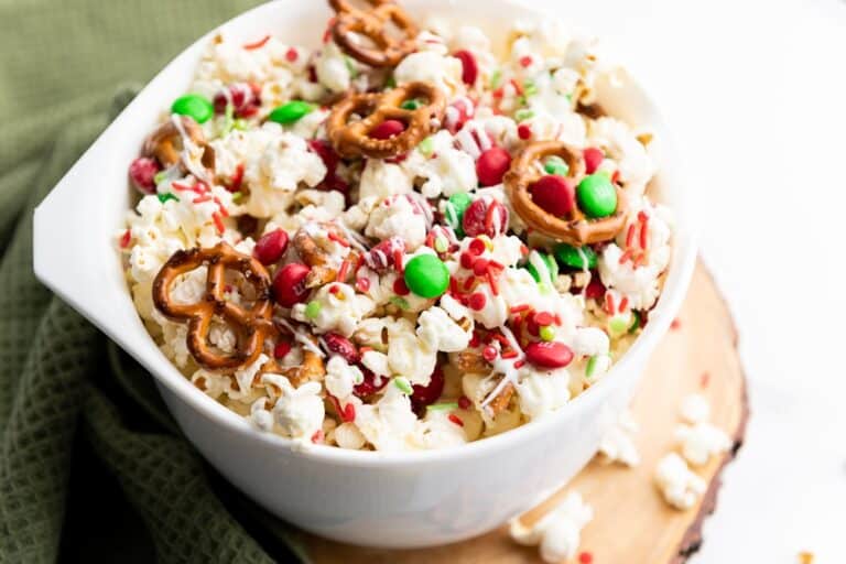 christmas popcorn in a white bowl