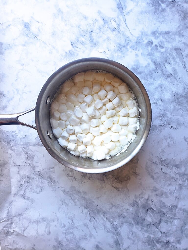melted butter and marshmallows in a pot