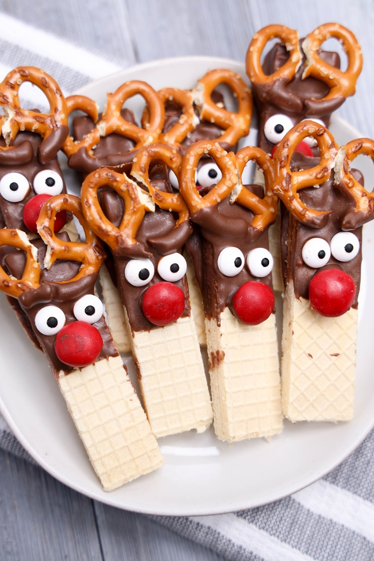candy eyes placed on top of dipped chocolate wafer