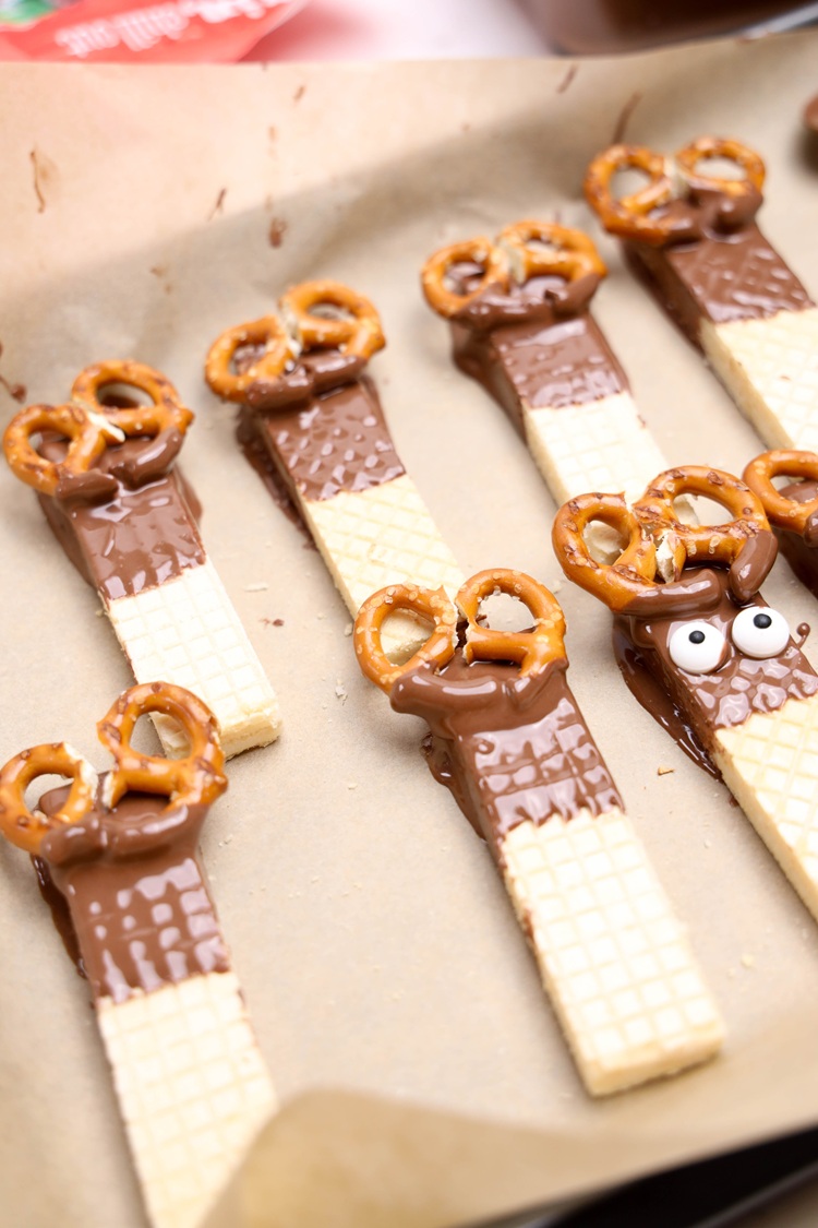 pretzels dipped in chocolate and put on top of wafer