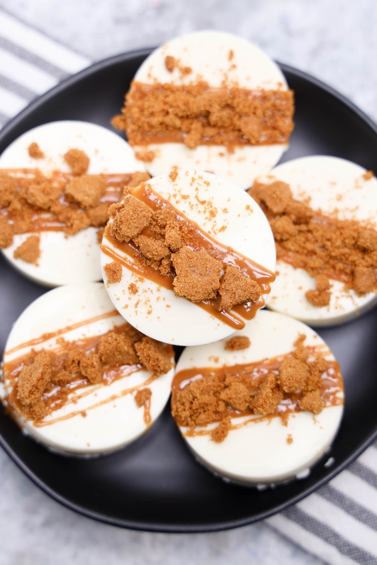crushed biscoff cookies drizzled over chcolte dipped ritz for texture and crunch