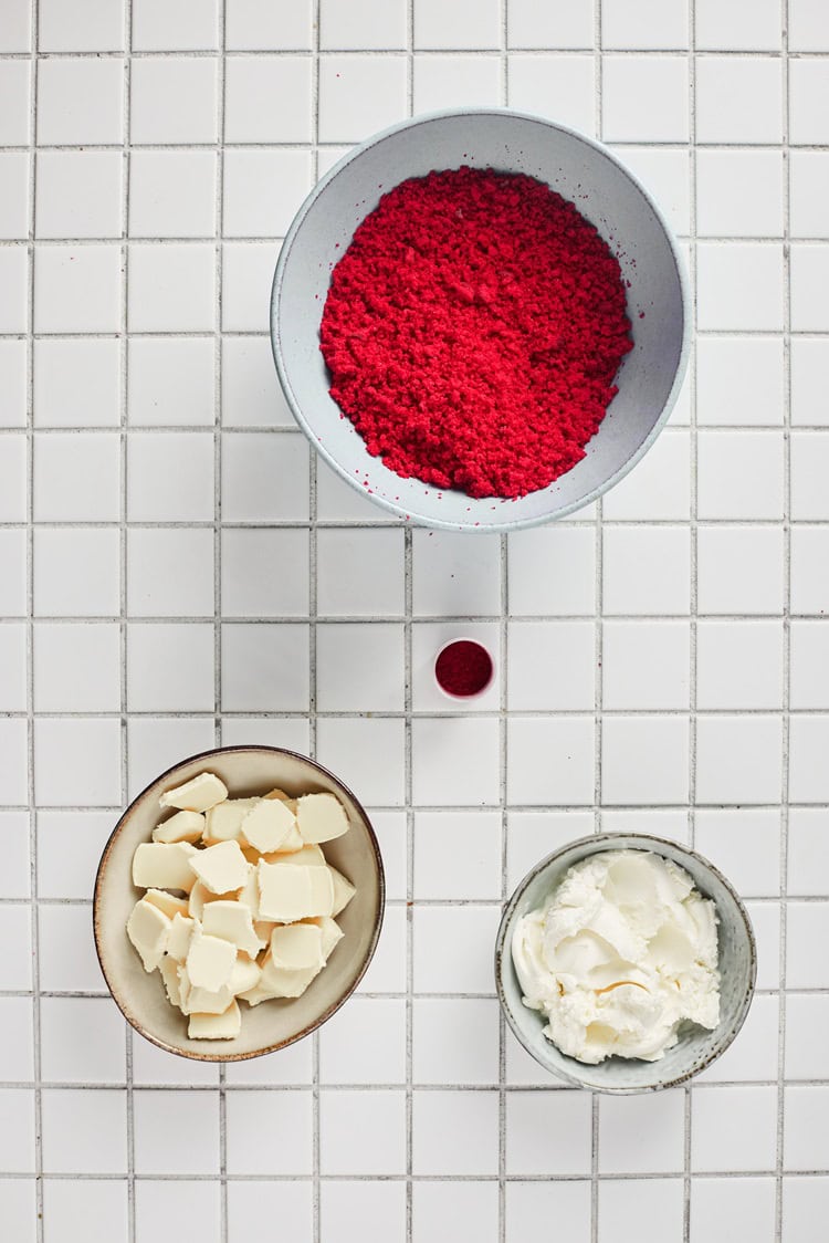 A picture of a red velvet cake crushed into crumbles.