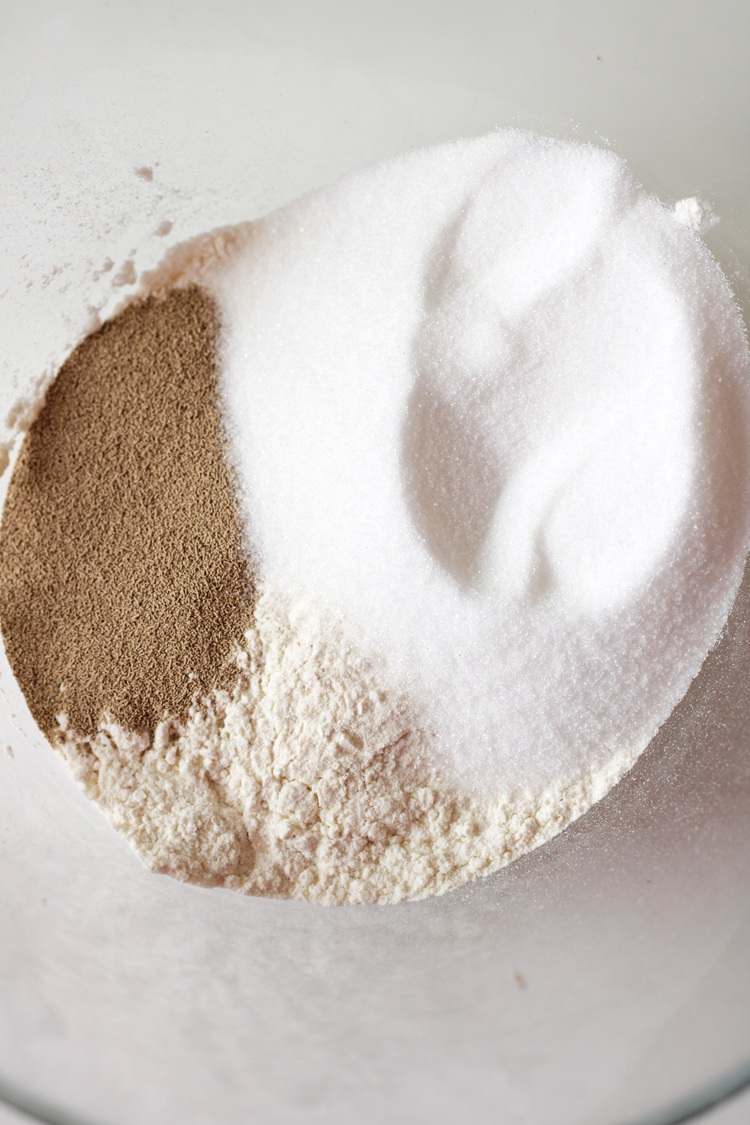 A picture of dry ingredients to make donuts in a bowl.