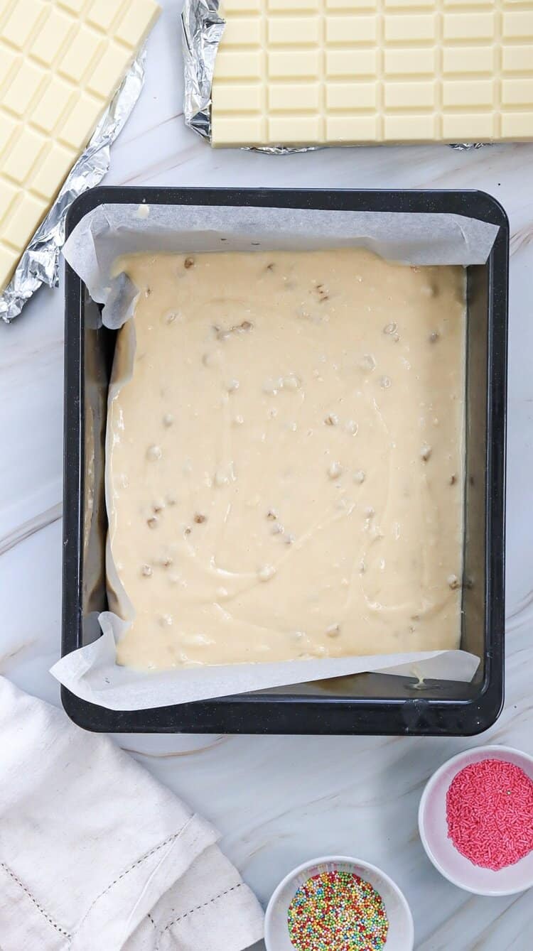 A picture of unbaked cake batter in a baking pan.