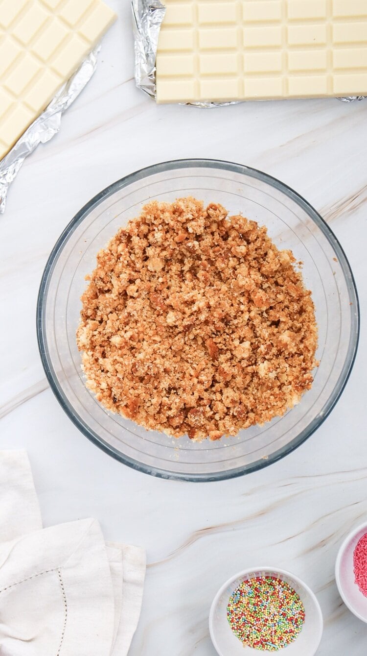 A picture of cake crumbles in a bowl.