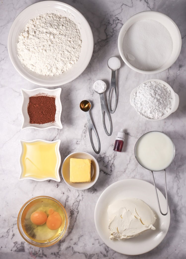 A picture of ingredients needed to make red velvet bundt cake.