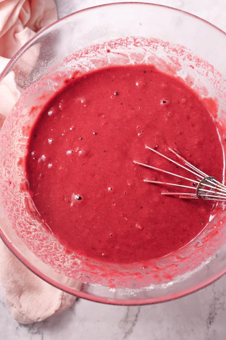 A picture of wet and dry ingredients mixed together.