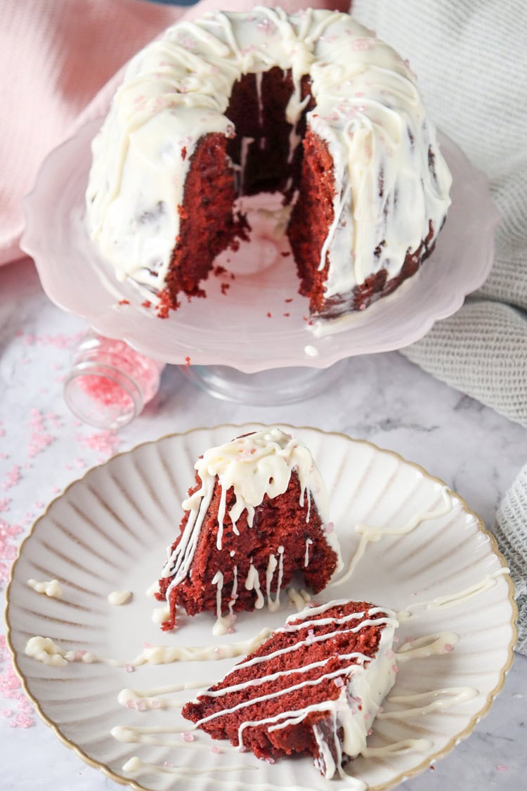 A picture of two slices cut from a red velvet bundt cake.