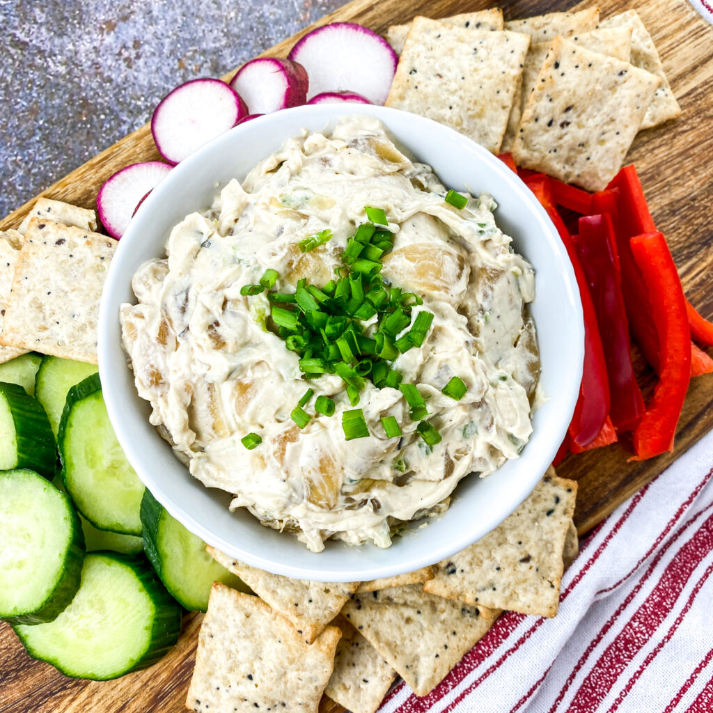 An overhead picture of caramelized onion dip in a bowl.