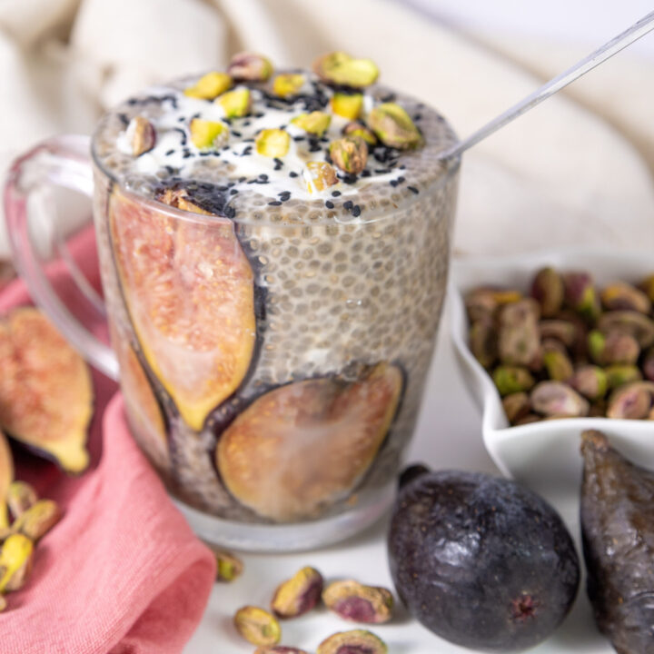 A picture of chia udding with figs in a glass mug.