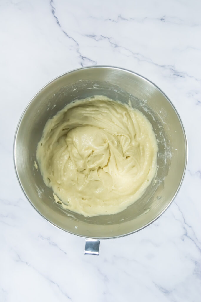 A picture of cupcake dough in a tin bowl.