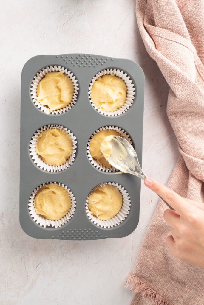 easter vanilla cupcakes batter in muffin tin