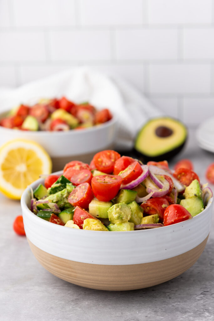 A picture of a finished bowl of avocado salad.