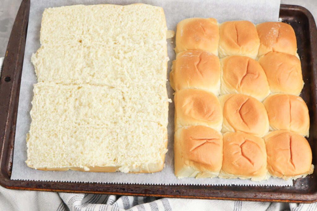 A picture of Hawaiian rolls cut in half to make sandwich bread.