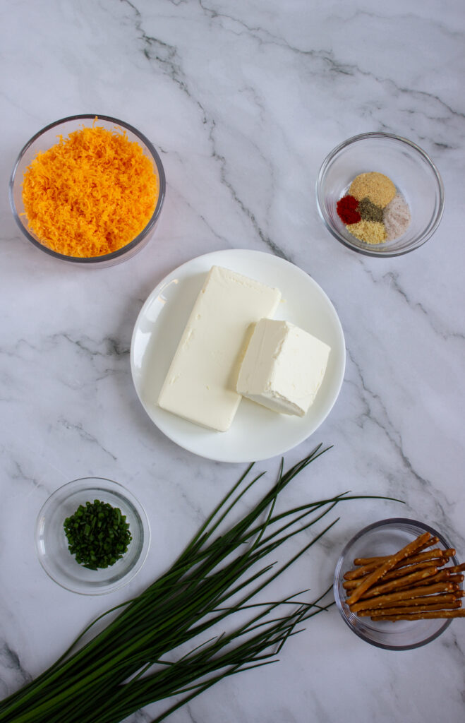 A picture of ingredients needed to make pumpkin cheeseballs.