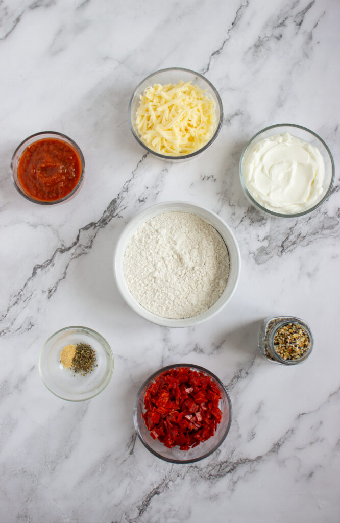 A picture of ingredients needed to make pizza bagel bites.