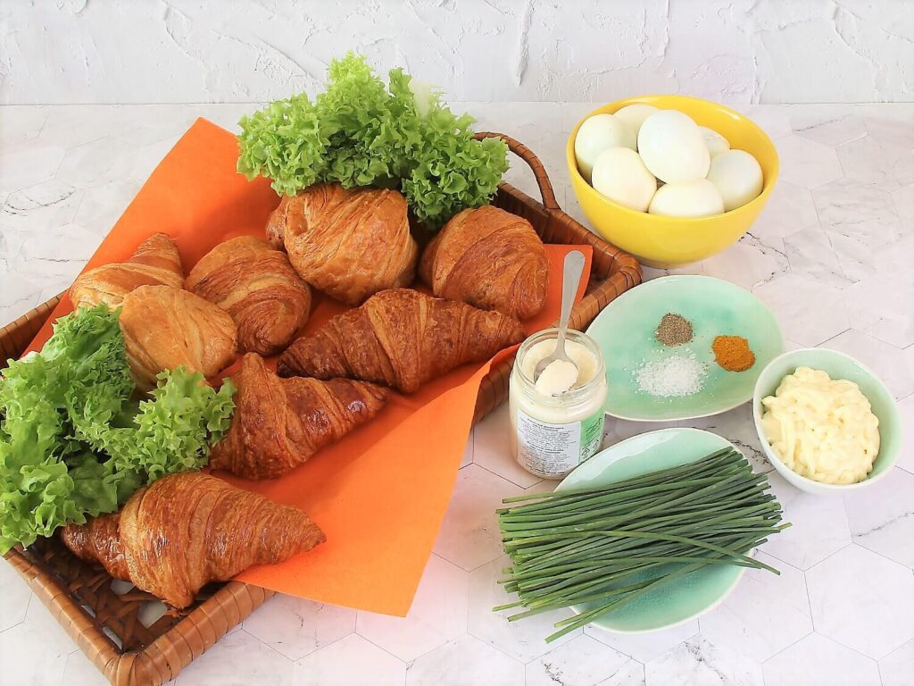 A picture of the ingredients to make croissant egg salad sandwiches.