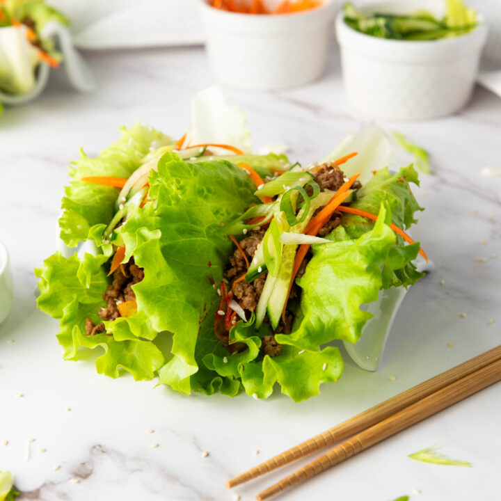 A picture of a korean beef lettuce wrap.