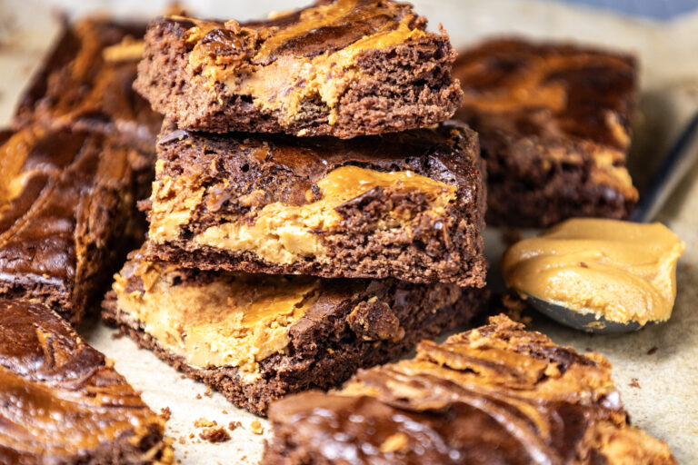 A picture of a collection of peanut butter brownies.