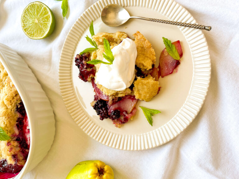 A picture of pear and blackberry cobbler.