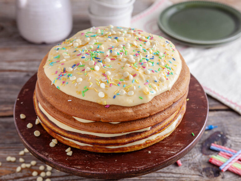 A picture of a pumpkin pancake birthday cake.