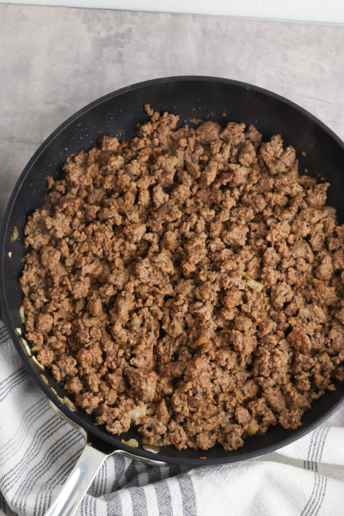 A picture of cooked ground beef in a skillet.