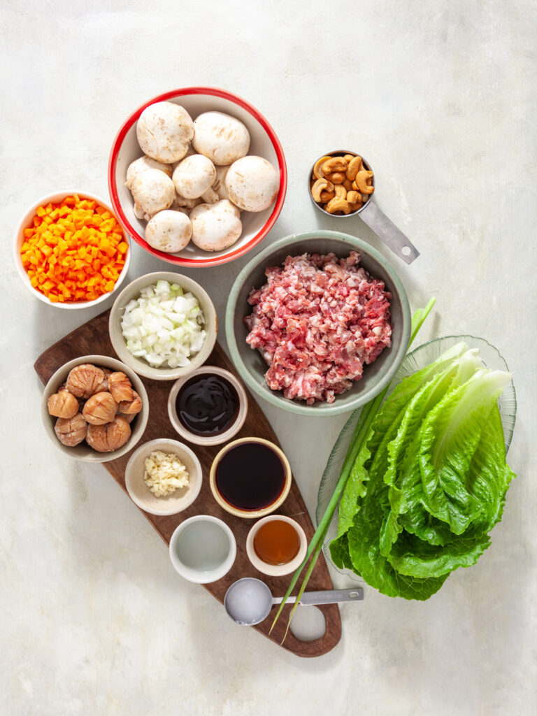 A picture of ingredients needed to make chinese pork lettuce wraps.