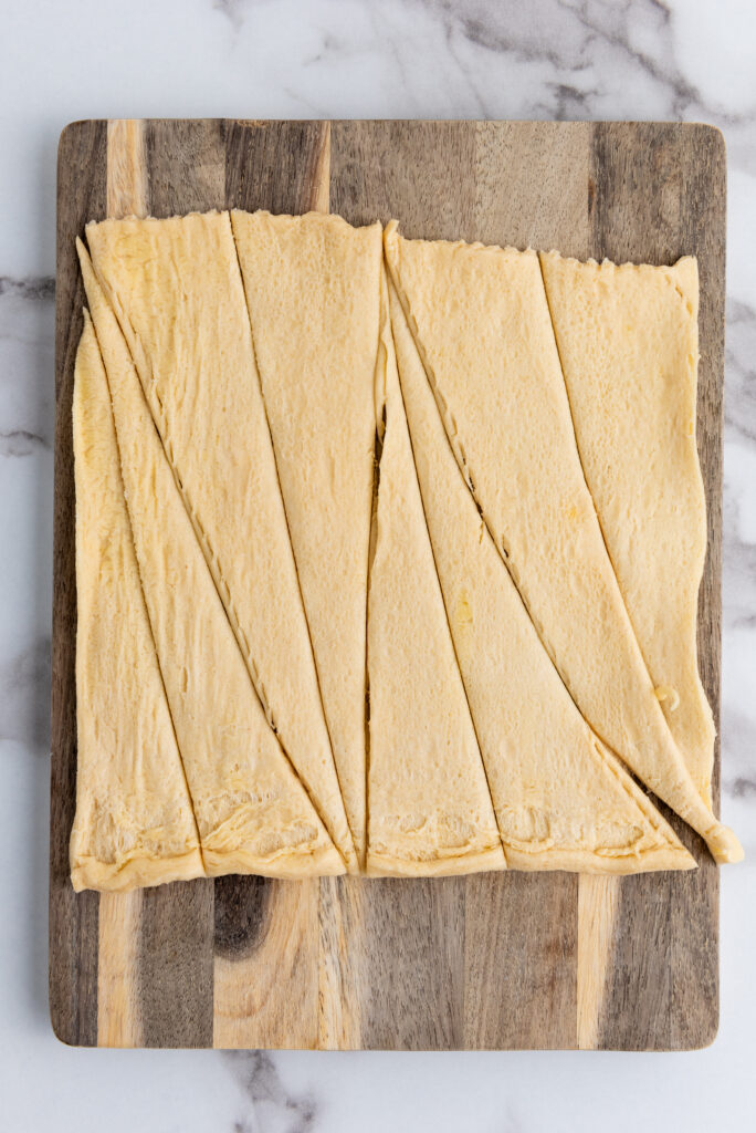 cut croissant dough to make triangles